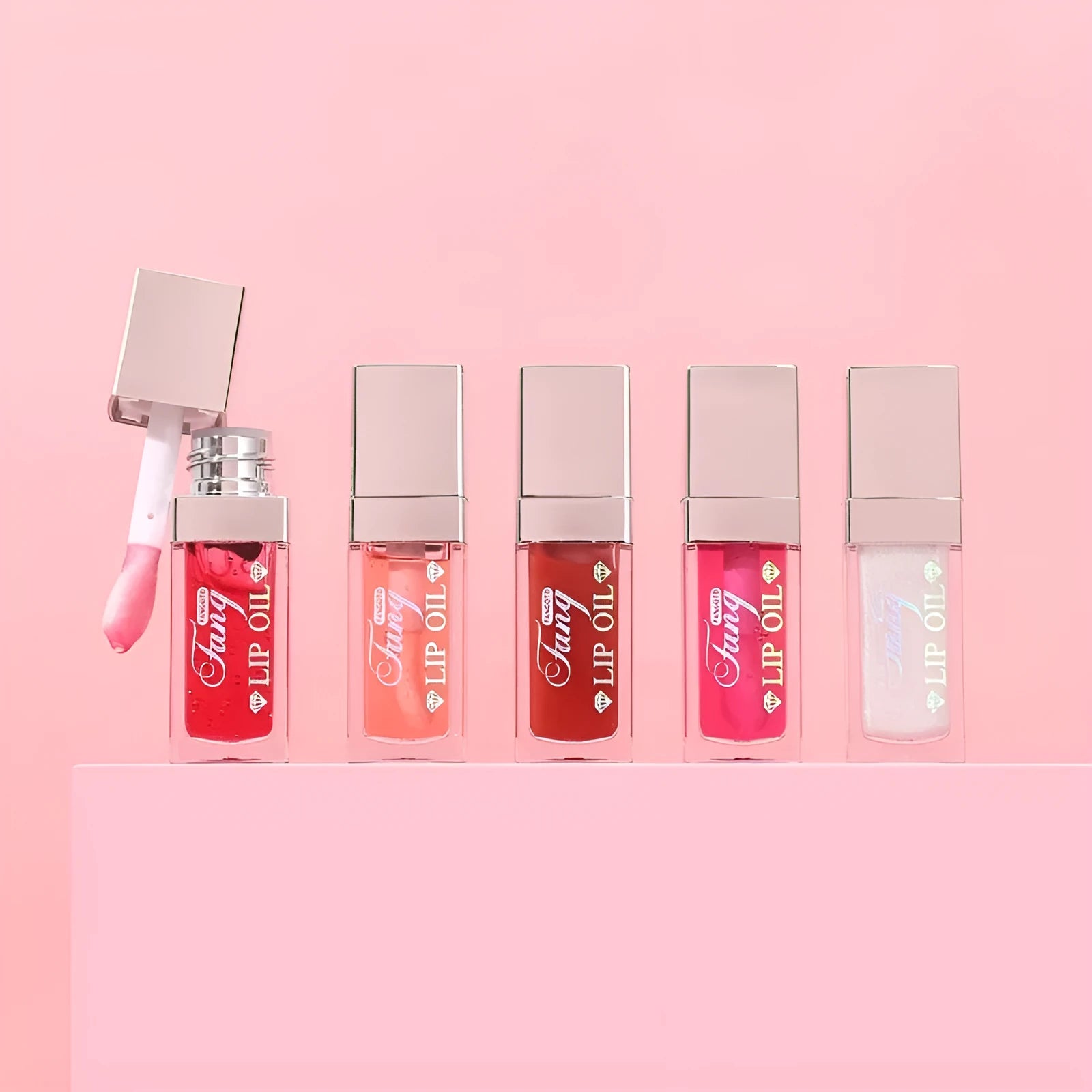 Bright mint lip gloss tube with five colour options showing moisturising and repairing lipstick