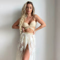 Three-piece backless push-up bikini set in solid colour with top, panties, and skirt.