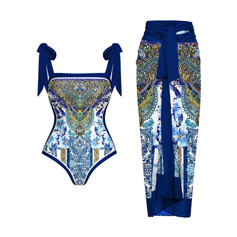 Women's yellow one-piece swimsuit with floral pattern and matching white chiffon skirt.