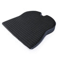 Memory foam seat cushion in grey with elastic strap on a car seat