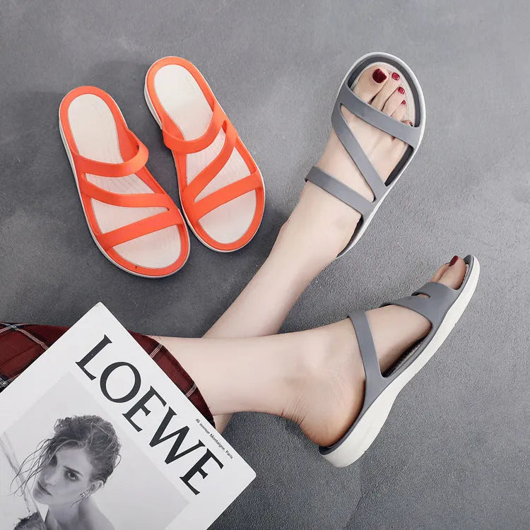 Women's solid colour summer sandals with a breathable PP upper and flat sole.