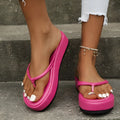 Thick-soled herringbone pattern flip-flops in multiple colours on a white background