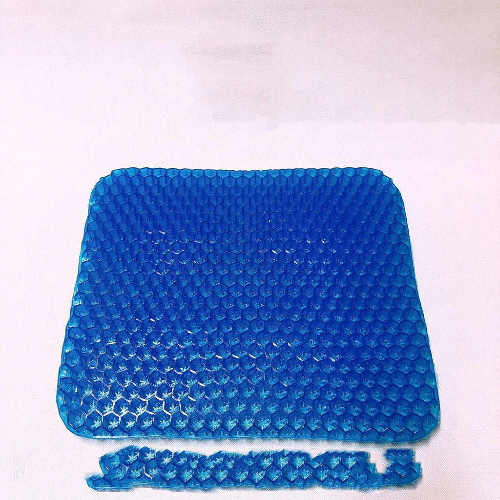 Square breathable honeycomb gel seat cushion with removable PVC cover on a chair.