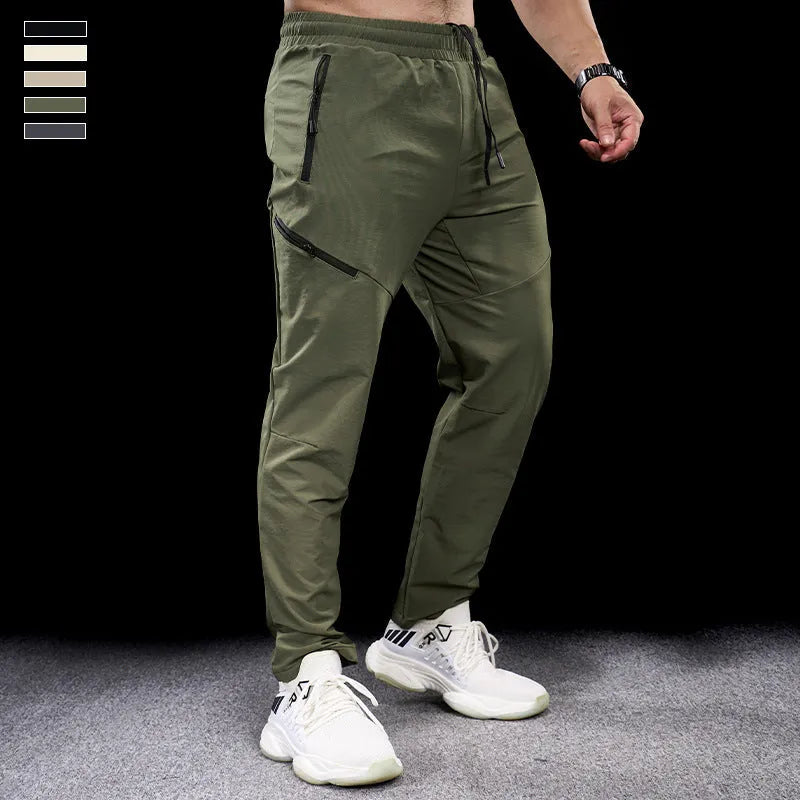 Men's black waterproof quick-drying nylon workout trousers for sports and exercise