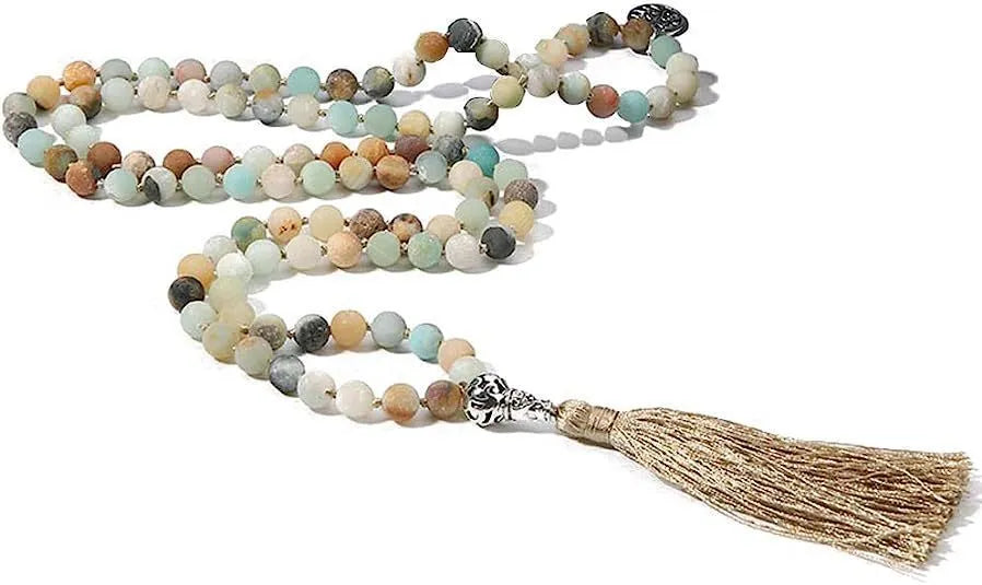 Handmade knotted beaded necklace with stone pendant showing 108 beads and geometric design