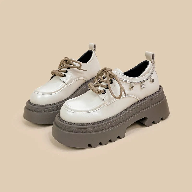 White women's platform leather shoes with chunky heel and lace-up front