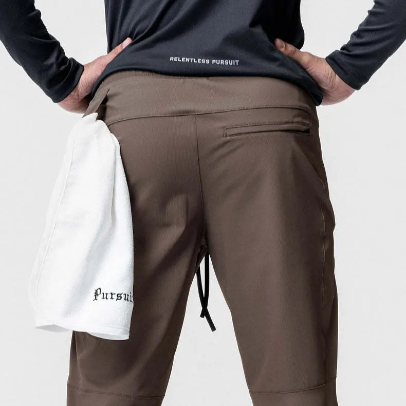 Men's grey ankle-tied fitness trousers with loose casual cut for exercise