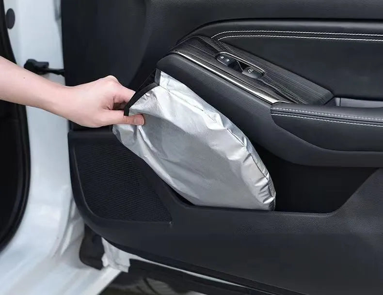 Titanium silver aluminium foil car sunshade showing reflective surface and folded storage