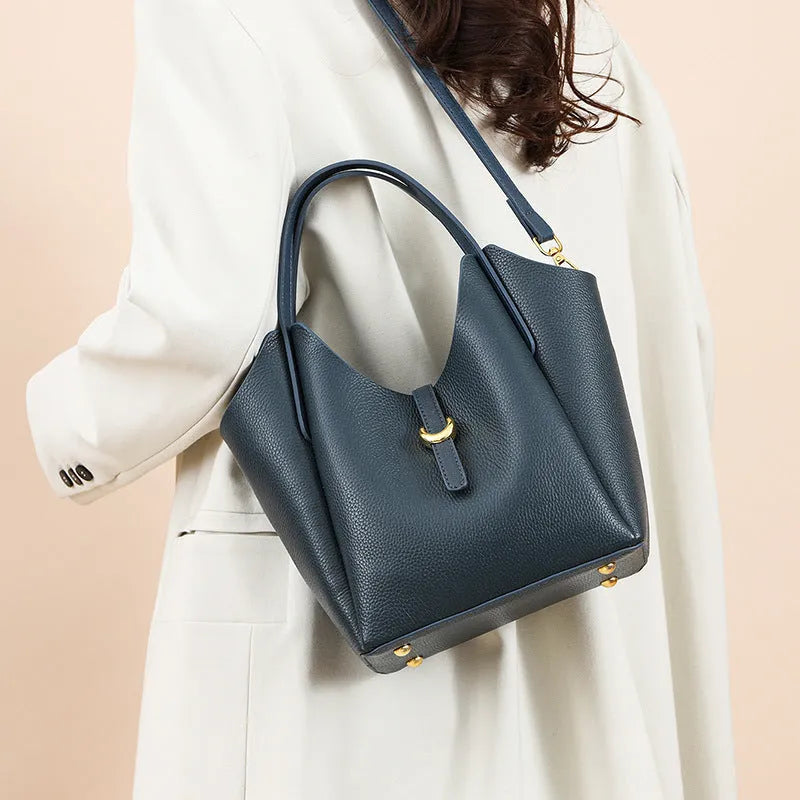 Genuine leather women's bucket handbag in retro style with large capacity and organisational features