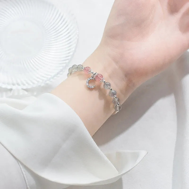 Natural moonstone bracelet with crescent moon charm and adjustable silver chain for women