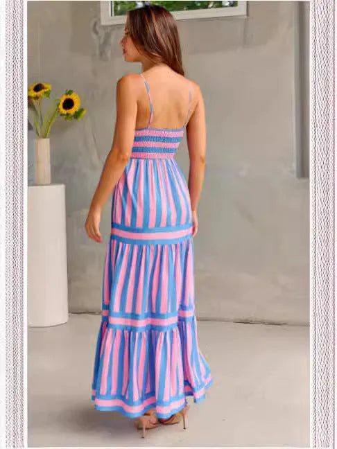 Long striped backless dress with square neck, side pockets, and adjustable suspender straps.