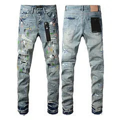 Black slim fit skinny jeans with straight leg, button fly, and manual distressing detail.