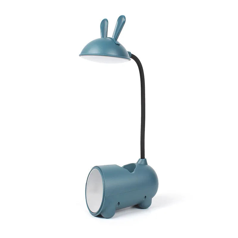 Cartoon-style USB table lamp with pen storage compartment in green colour