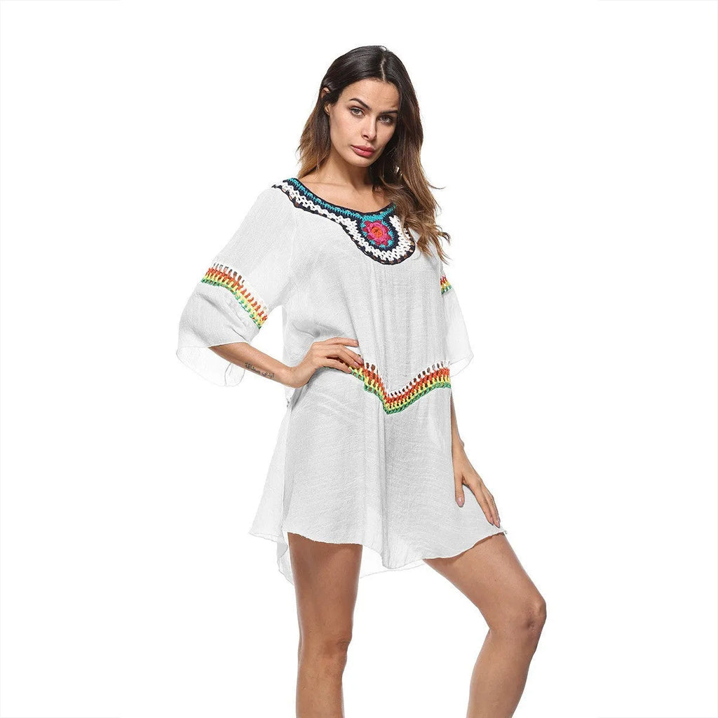 Crocheted white sun protection beach cover-up top for women, loose fit.