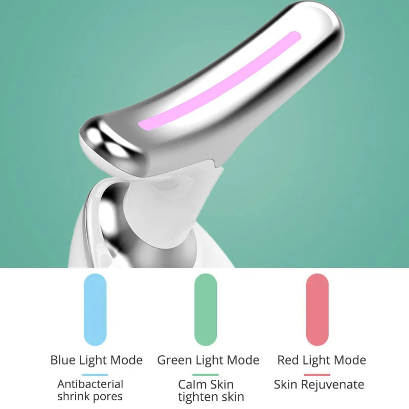 White EMS thermal neck lifting massager with LED lights, shown with USB cable and moisturiser.