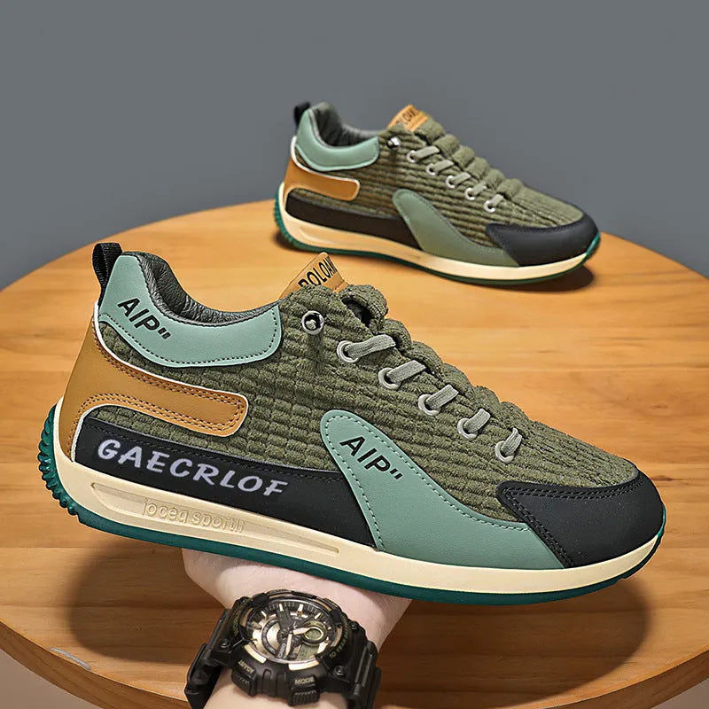 Men's green and grey mesh running shoes with viscose soles and lace-up fastening