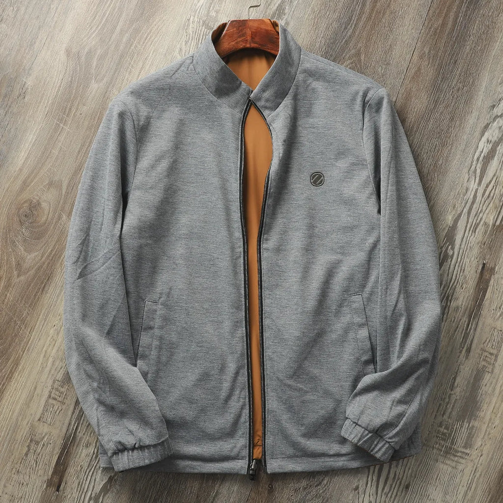 Men's simple stand collar jacket in polyester and cotton blend shown in one of four available colours.