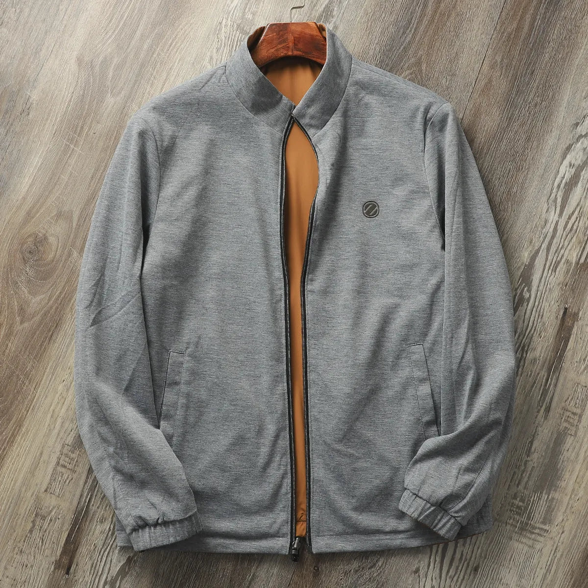 Men's simple stand collar jacket in polyester and cotton blend shown in one of four available colours.