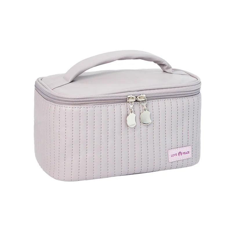 Open-top PU leather makeup bag in a pastel colour from a range of six options.