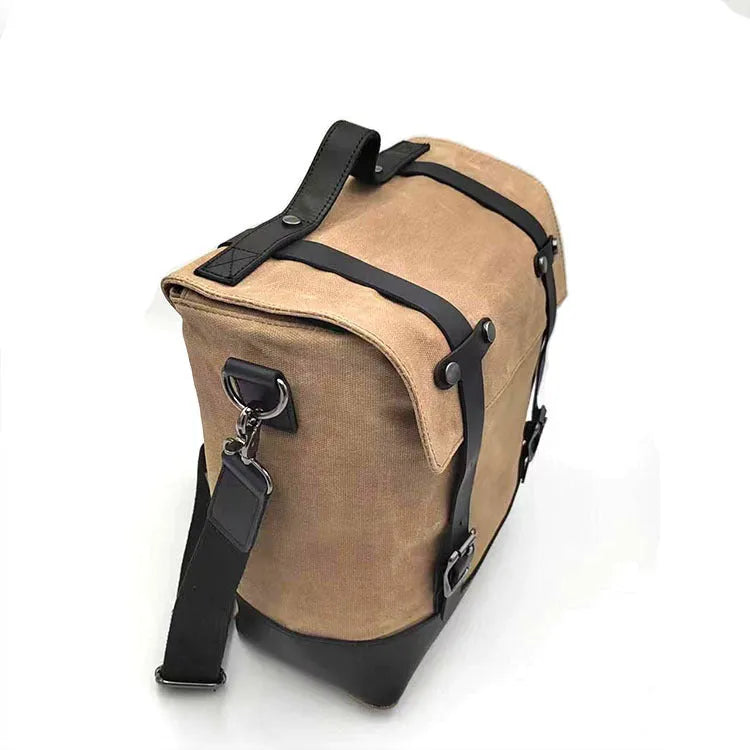 Waterproof canvas motorcycle side bag with cowhide reinforcement in black colour