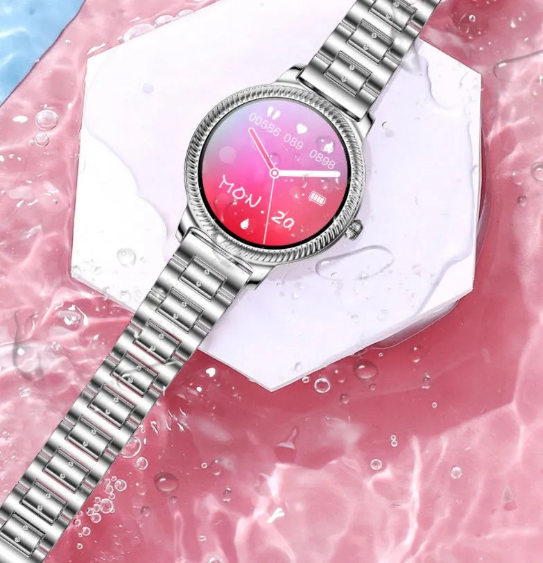 AK38 ladies smart watch with stainless steel Milanese strap and gold finish on wrist.
