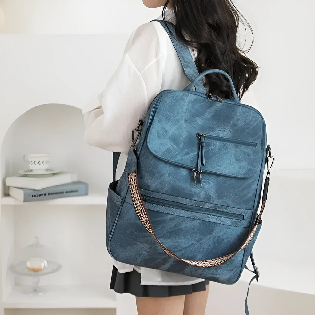 Retro college backpack in black with curved shoulder straps and stitching details