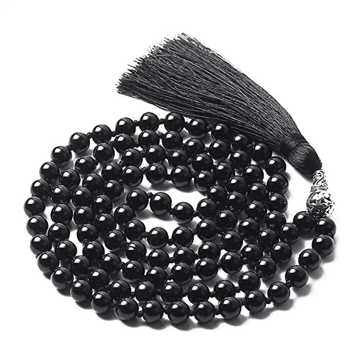 Long geometric agate necklace with tassel pendant in natural stone colours on a 95-100cm chain.