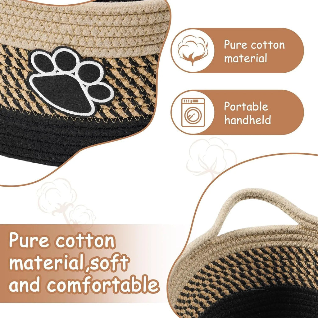 Light beige handmade cotton rope storage basket with handle, shown with toys inside.
