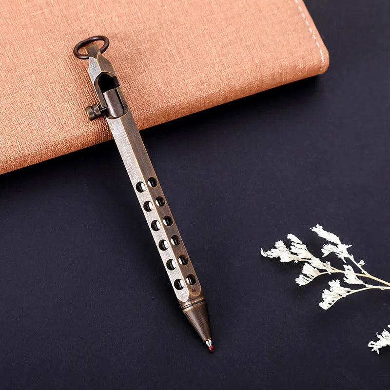 Brass hexagonal roller pen with 0.5mm tip showing six flat sides and retro design