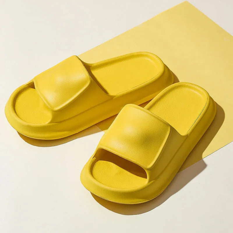 Pair of thickened EVA flip-flop slippers in a chosen colour, showing the non-slip sole and unisex design.
