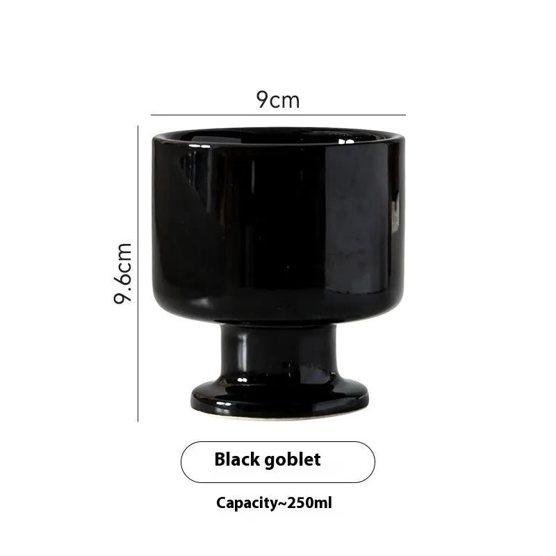 Hand-pinched irregular ceramic mug with modern minimalist design in solid colour