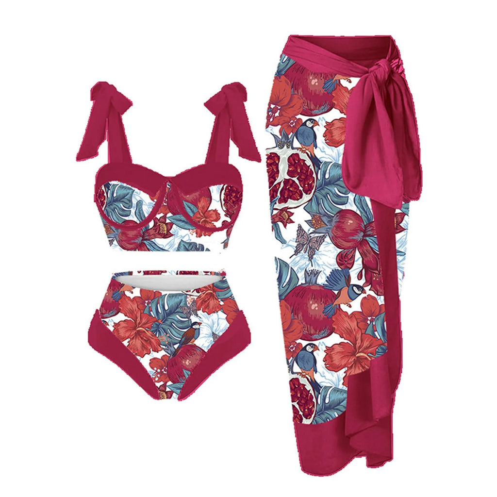 Women's pink printing split swimsuit three-piece set with skirt, bra, and panties on a mannequin.