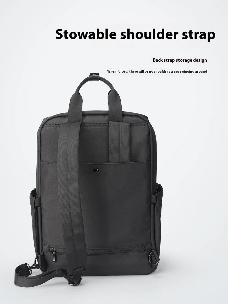 Black Oxford cloth computer backpack with 20-35L capacity showing interior polyester lining