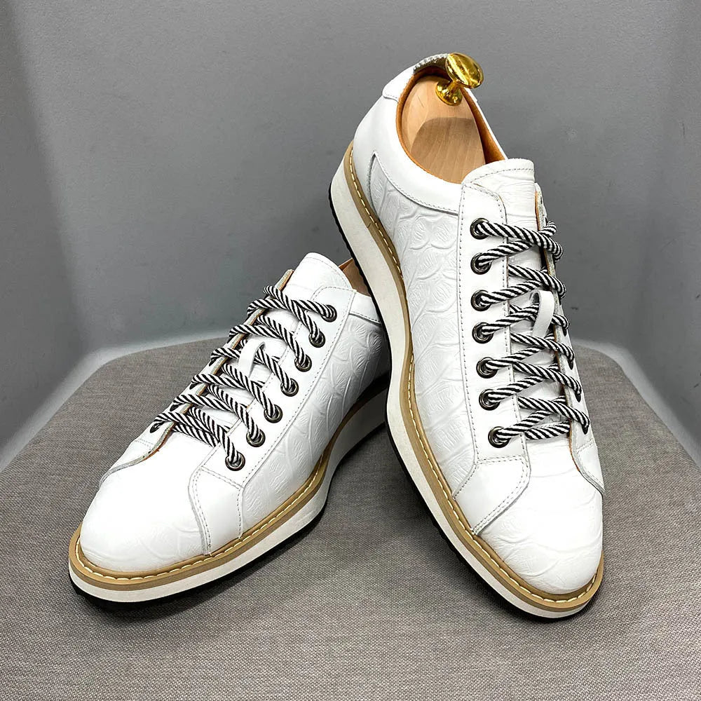 Men's low-top fashion shoes with an embossed pattern on the upper and front-tie laces.
