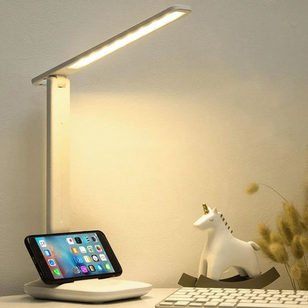 White plastic bedside lamp with touch dimming controls for children's bedroom eye protection lighting