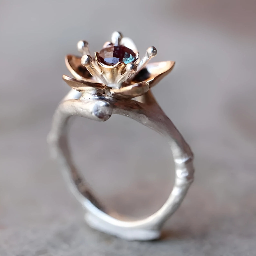 Silver two-tone floral geometric women's ring showing alloy construction and contemporary design