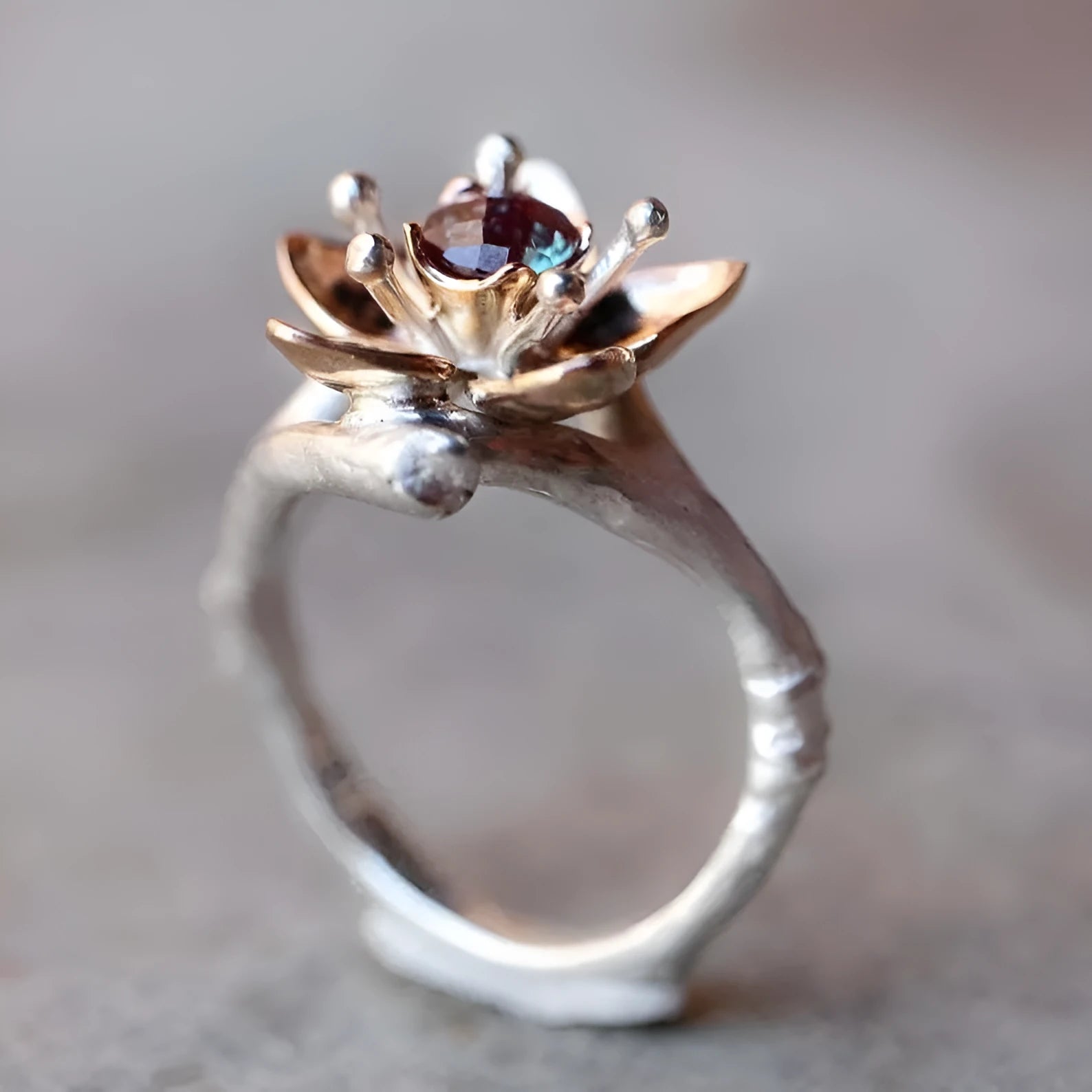 Silver two-tone floral geometric women's ring showing alloy construction and contemporary design