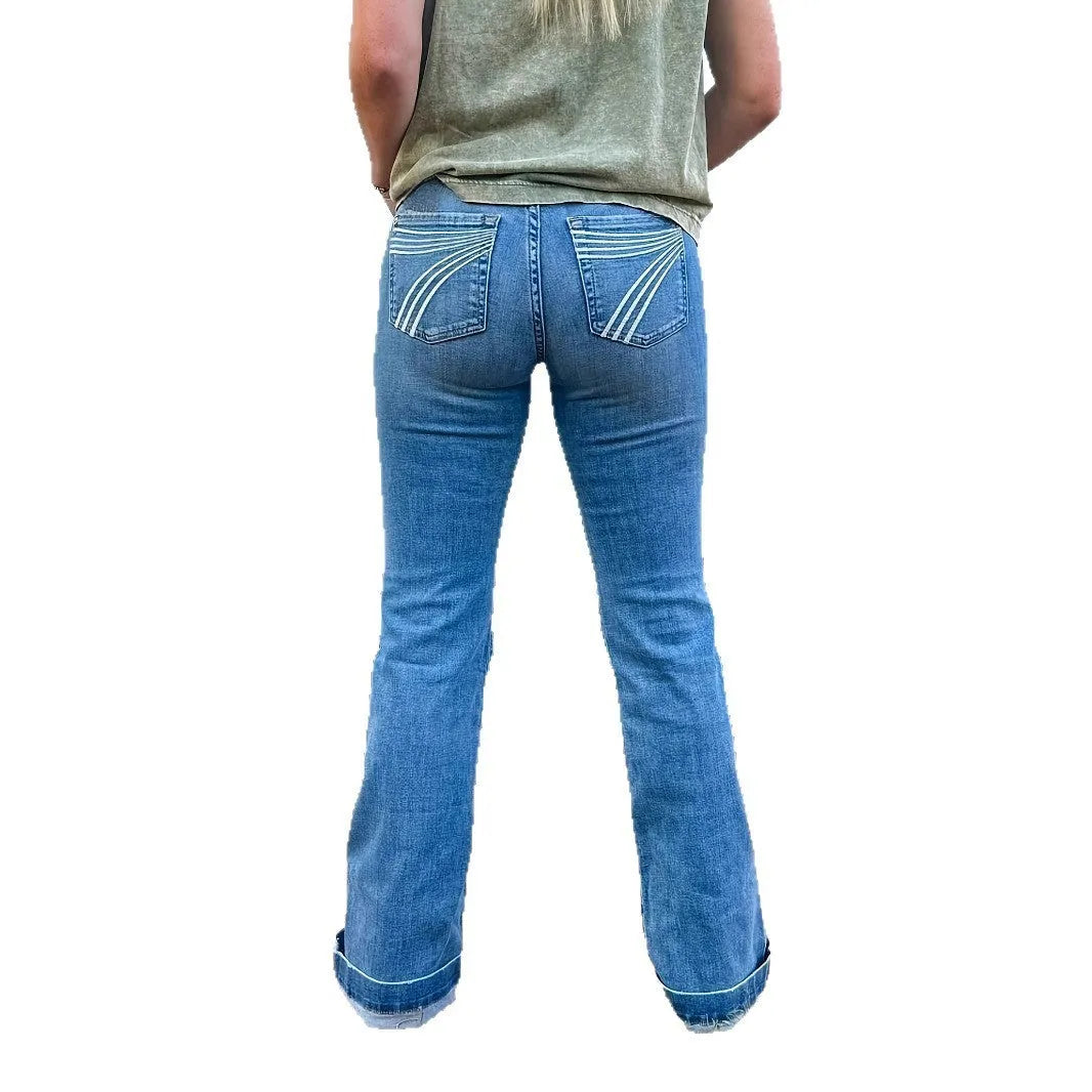 Women's slim fit elastic mid-waist jeans with slightly flared leg and embroidery detailing