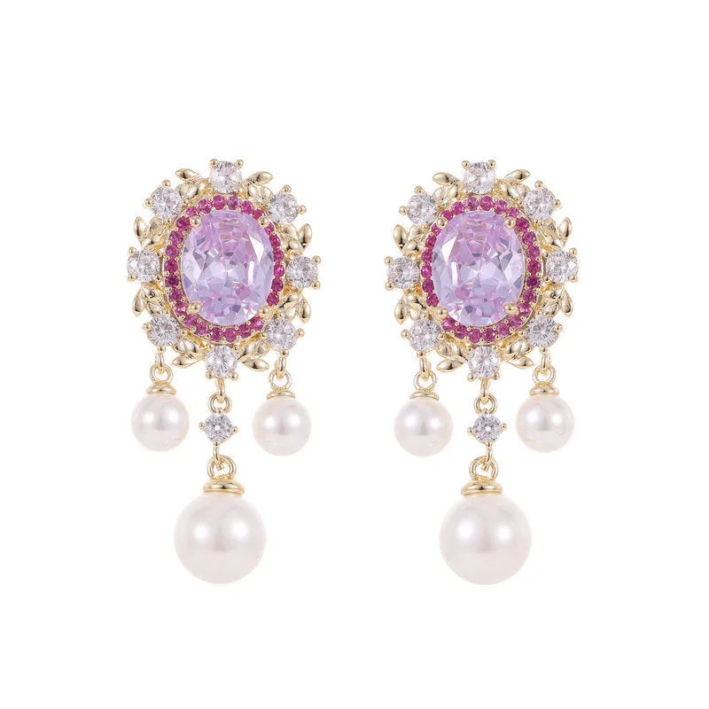 Oval geometric copper drop earrings with pearl elements, inlaid zircon treatment, and tassel detailing in light purple colour