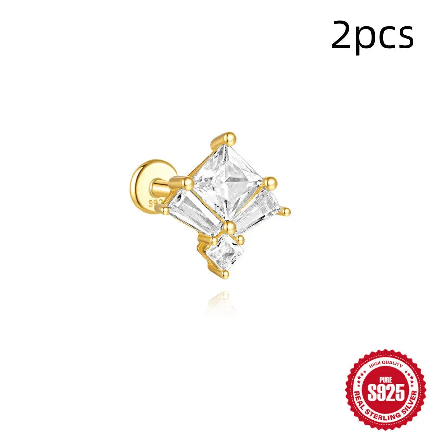 Golden geometric sterling silver earrings with zircon details for double piercings