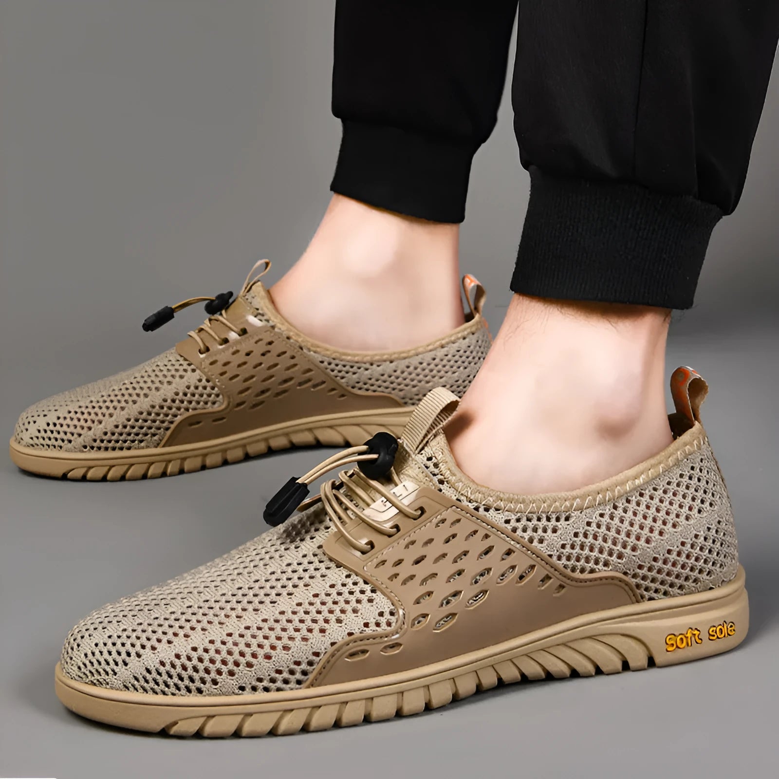 Men's breathable mesh casual shoes in sand colour with elastic band and rubber sole.