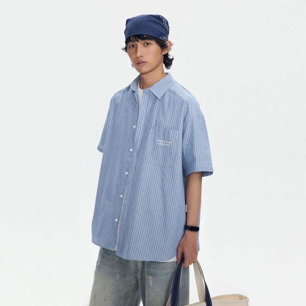 Blue striped overalls shirt with short sleeves and loose cardigan style