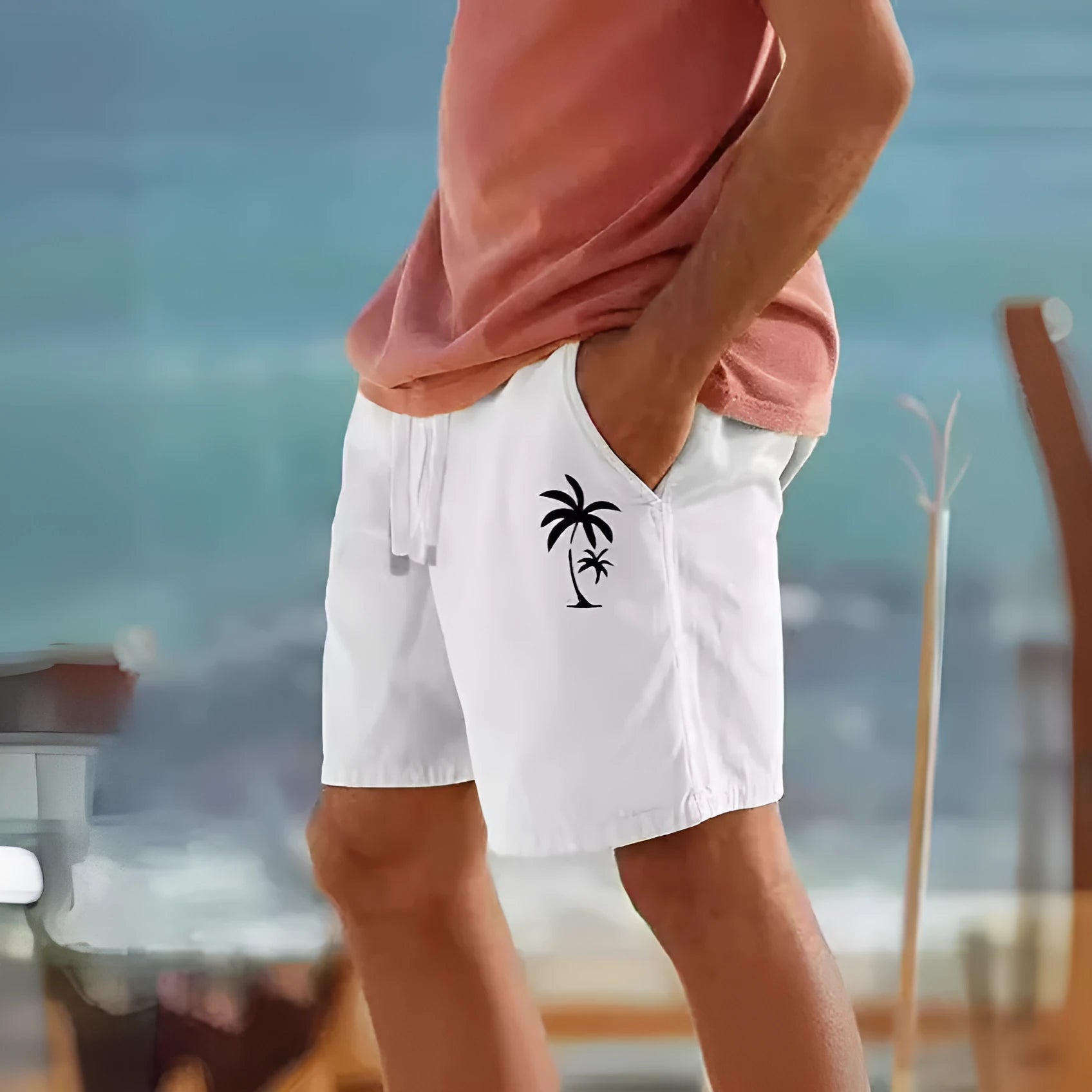 Men's cotton blend elastic waist shorts with a heat transfer patch, shown in army green.