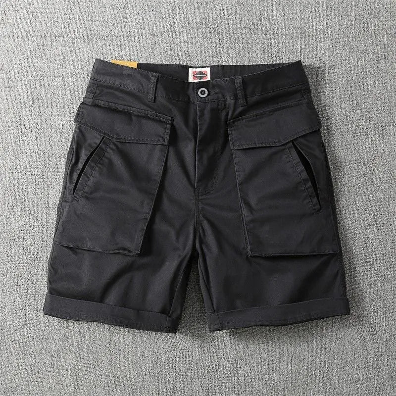 Men's army green cotton cargo shorts with multiple pockets on a straight leg.