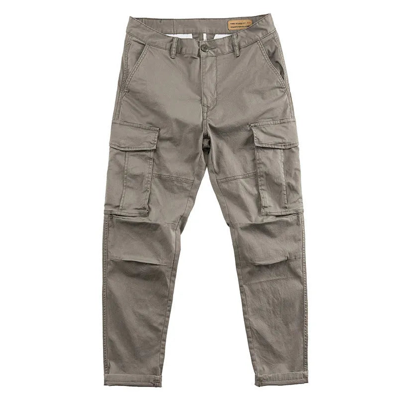 Men's solid colour cotton labour protection trousers with multiple pockets, shown in khaki.