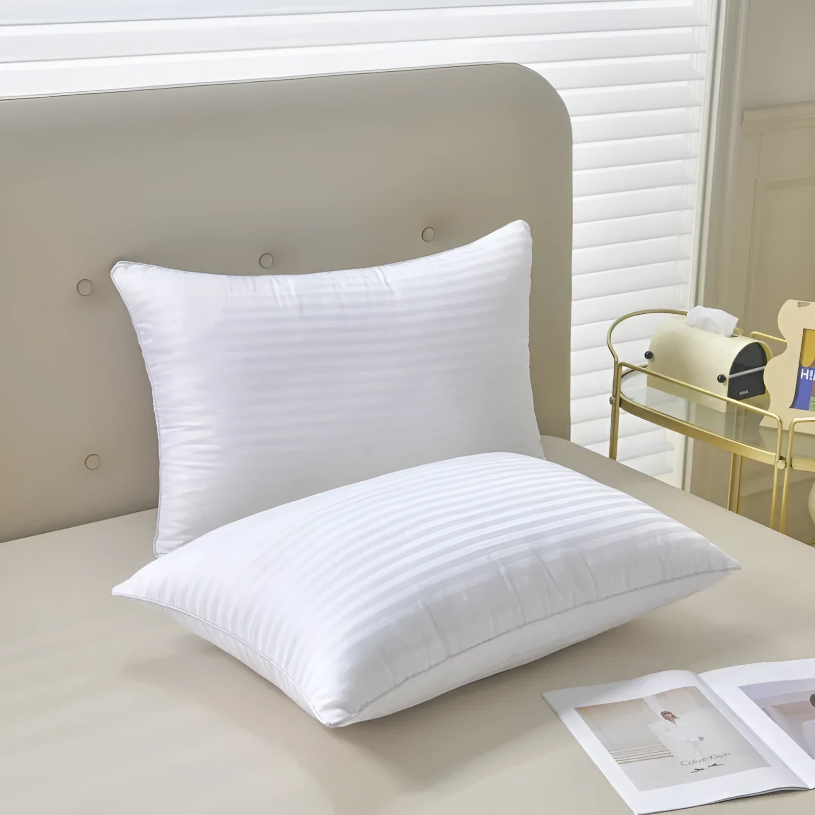 White cotton satin stripe pillow with feather cotton filling, shown in low, medium, and high loft versions.