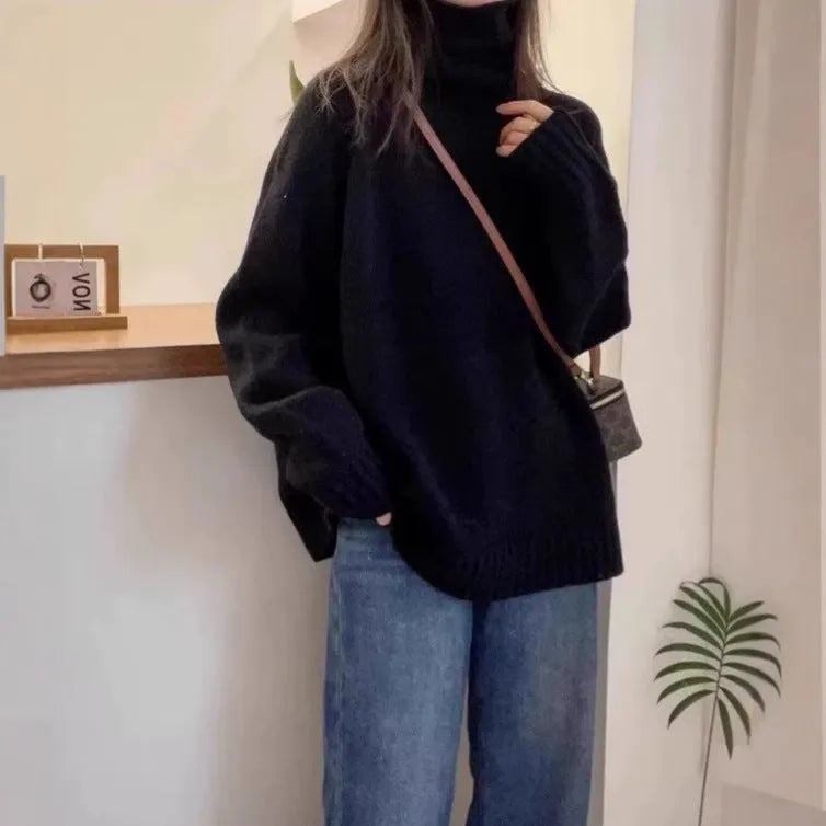 Women's loose red turtleneck sweater with thick curling pile collar, casual style.