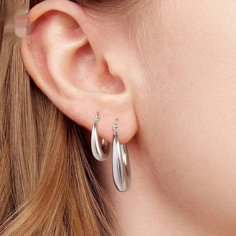Women's copper ring clip earrings with electroplating treatment in three size options