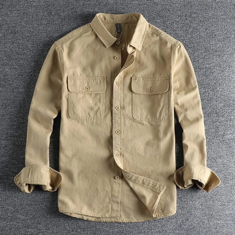 Man wearing loose fit long sleeve shirt overalls in cardigan style, made from polyester fabric