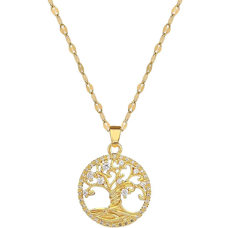 Gold-plated cross necklace with mother-of-pearl lucky tree pendant and rhinestone detailing on adjustable lip chain
